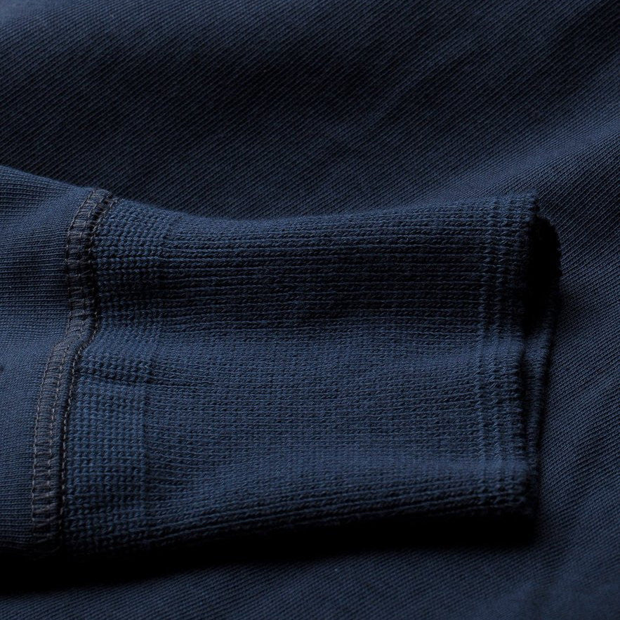 Close-up of a navy blue fabric texture