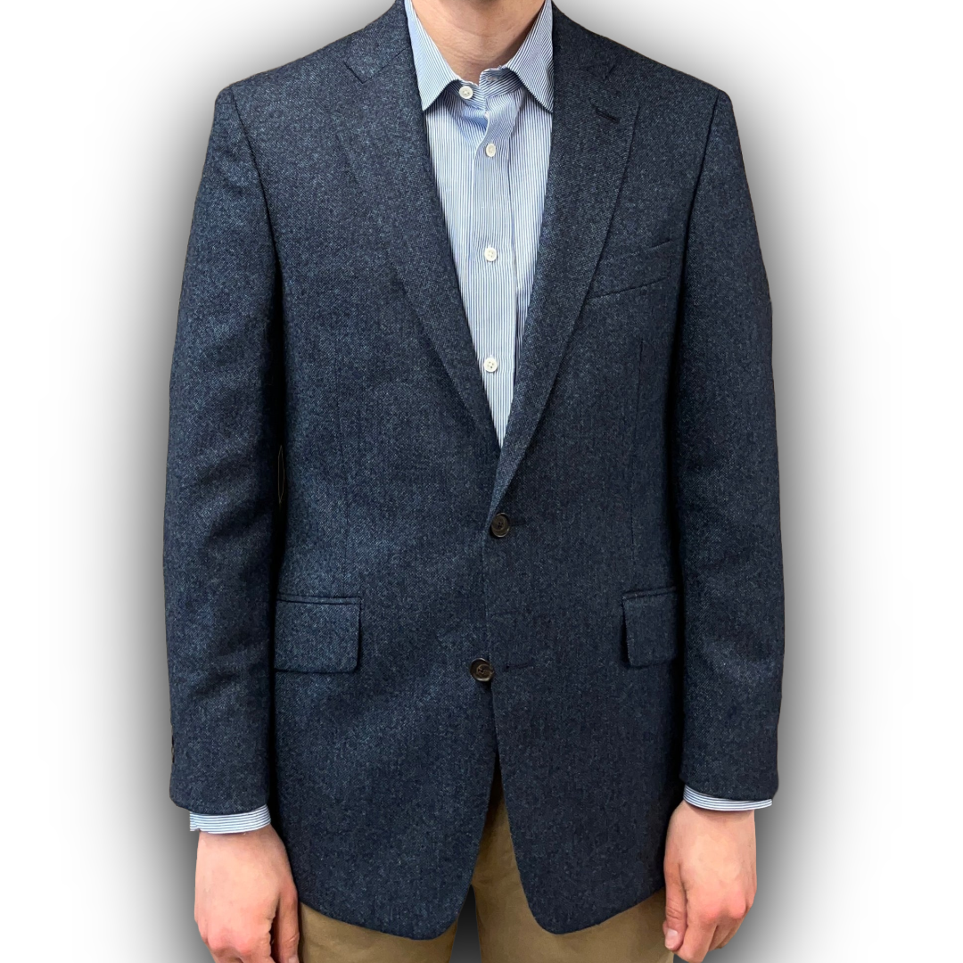 navy blazer- Navy with Blue Fleck tweed
Abraham Moon Shetland Bunch 'Denim' cloth
Double Vent
Slanted pockets
Two Button
Navy Lining
Three Button Working Cuff
Horn buttons
Golden Hanging Tab