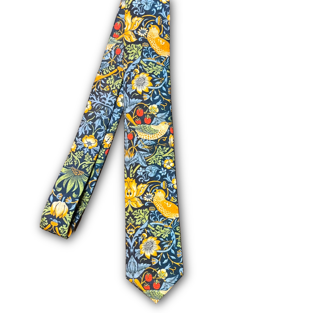 Colorful floral and bird patterned tie on a white background - William Morris - Strawberry thief in dark Navy.