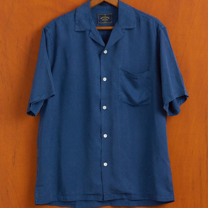 blue short sleeve shirt with Cuban collar. 