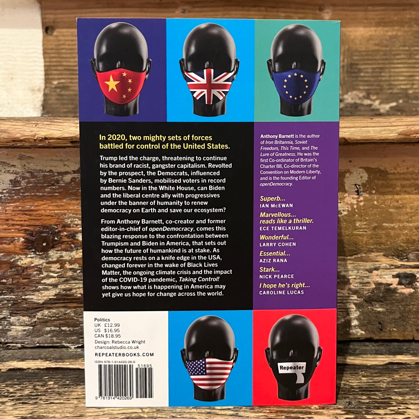 The back cover of the book 'Ruspoler' by Nancy Wright, featuring three illustrations of black helmets with red, white, blue, and green masks, set against a multicolor background with book reviews and publisher details.
