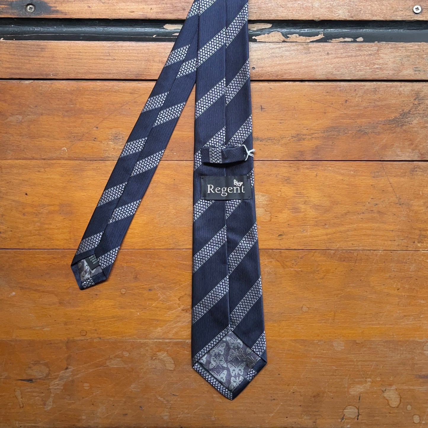 Regent - Woven Silk Tie - Navy with Tyre Track Stripe - reverse