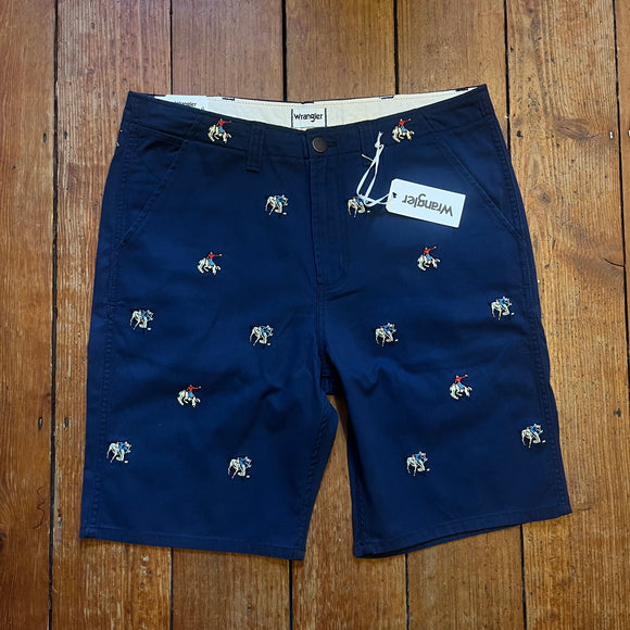Navy blue shorts with cowboy embroidery repeat patten. Button and fly fastening and belt loops