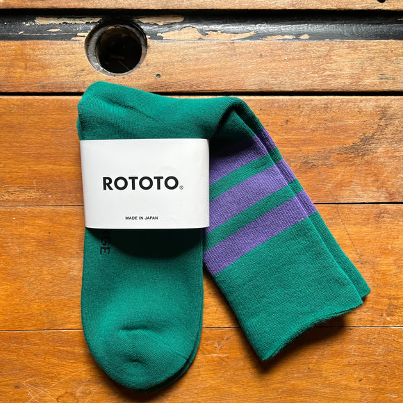 Rototo pair of socks in green with a purple stripe