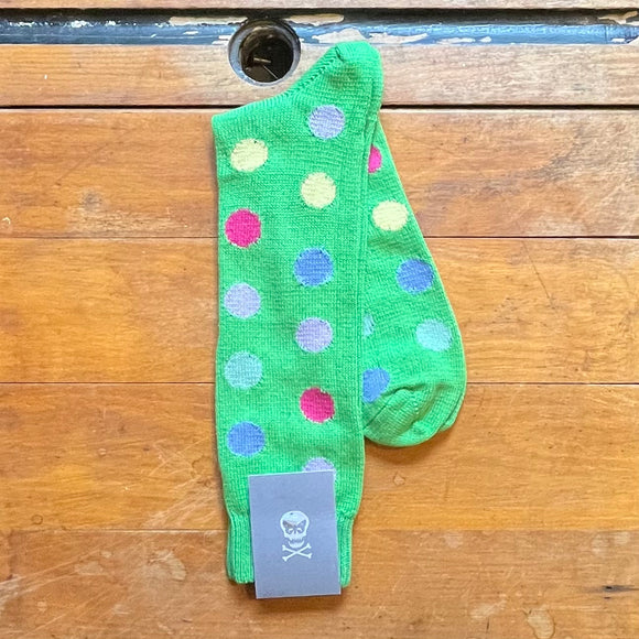 Pea green cotton socks with multicoloured spots