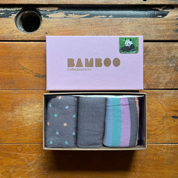 Three pairs of ladies bamboo socks in a presentation box - 1x Grey with polka dots, 1x multicoloured stripe, 1x grey with contrast heel and toe