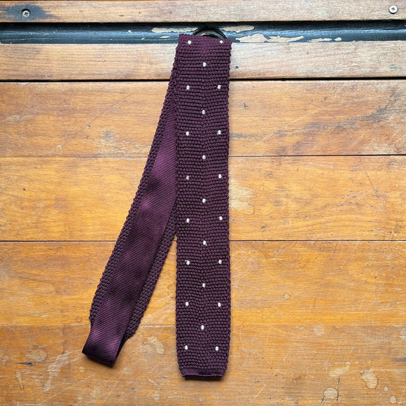 Burgundy knitted tie with champagne coloured spots
