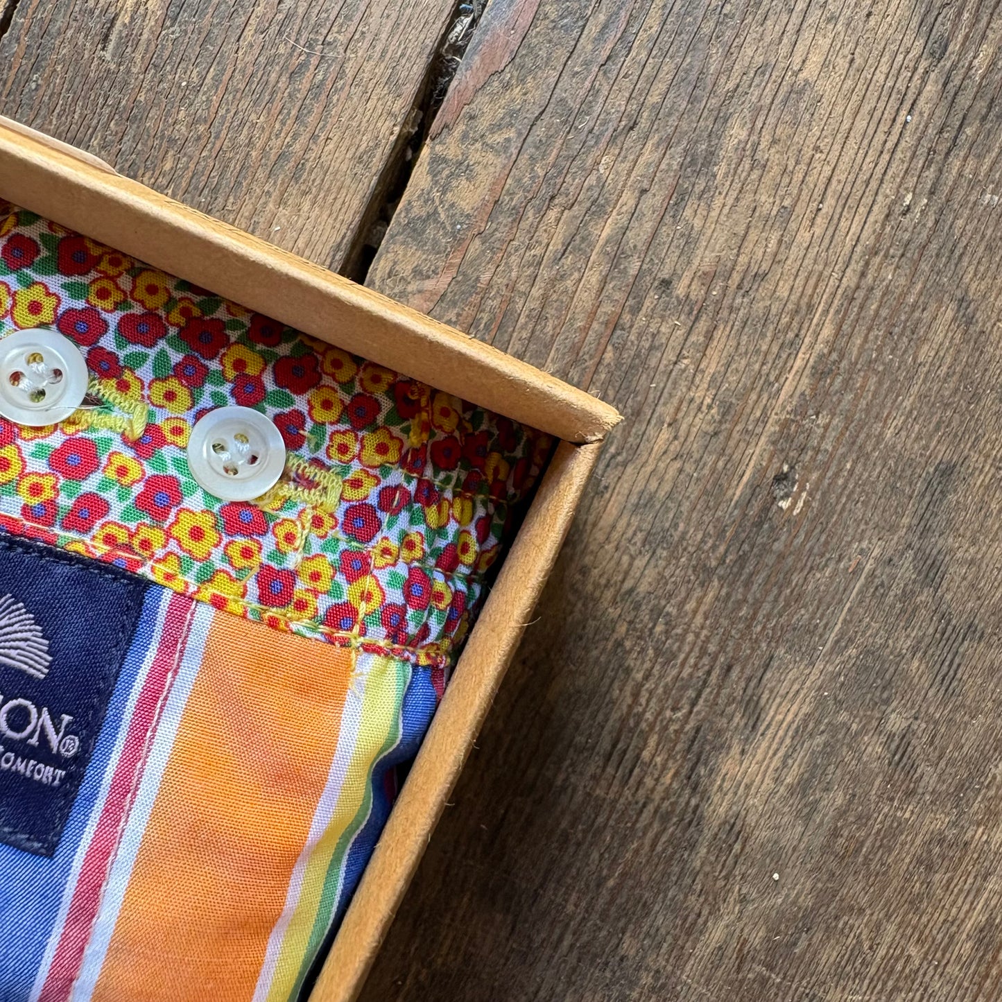 A close-up of a folded multicolor floral boxer