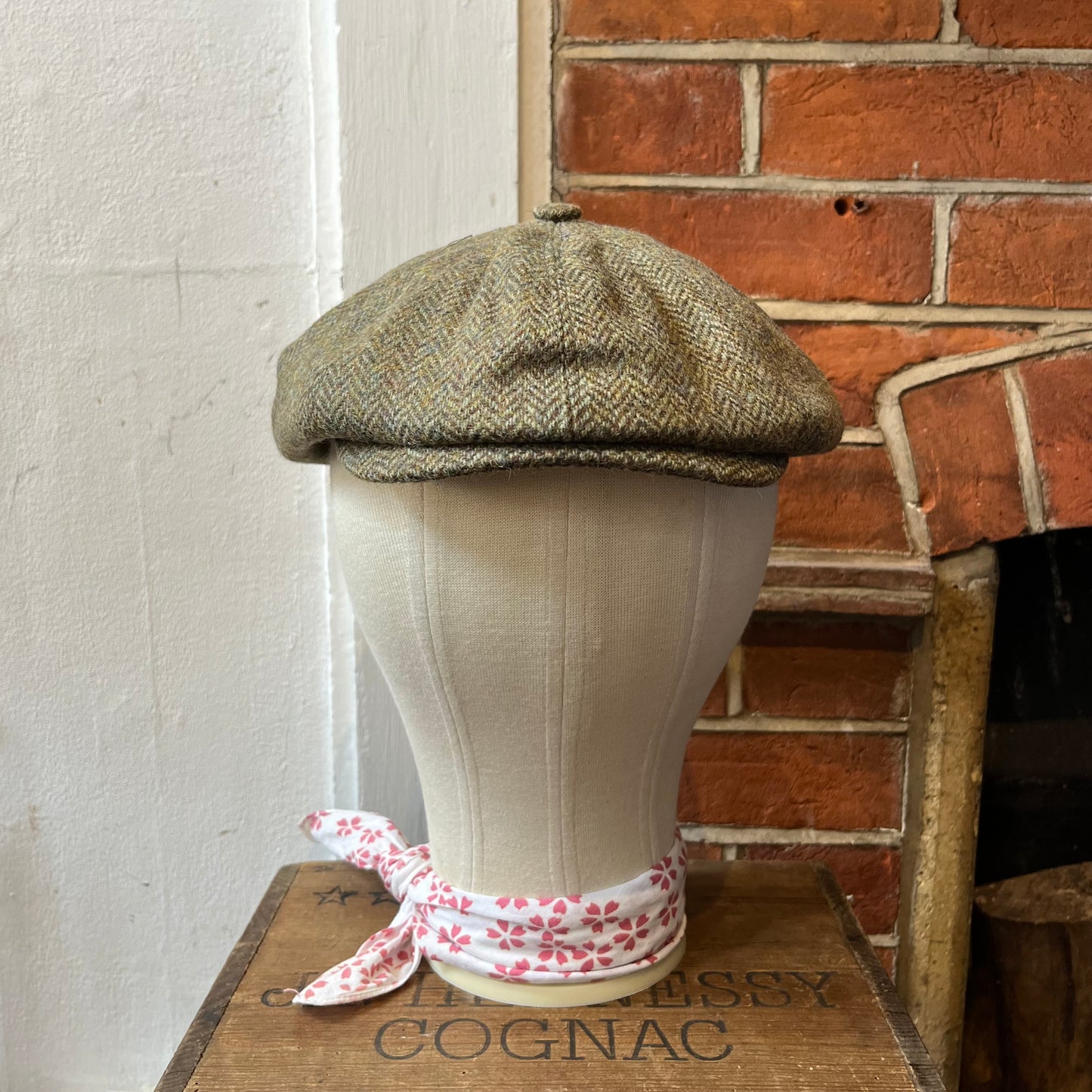 eight piece baker boy cap in green herringbone tweed