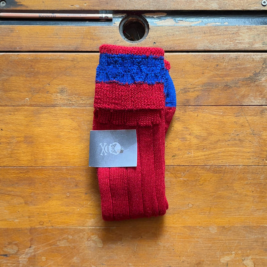 Crimson red boot sock with royal blue contrasting cuff band, toe and heel