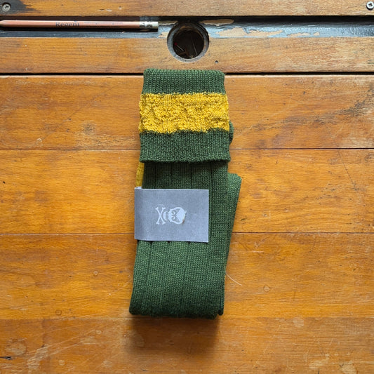 Olive green woollen boot sock with contrasting yellow cuff
