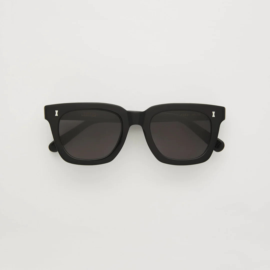 classic black thick rimmed 1960s style sunglasses.