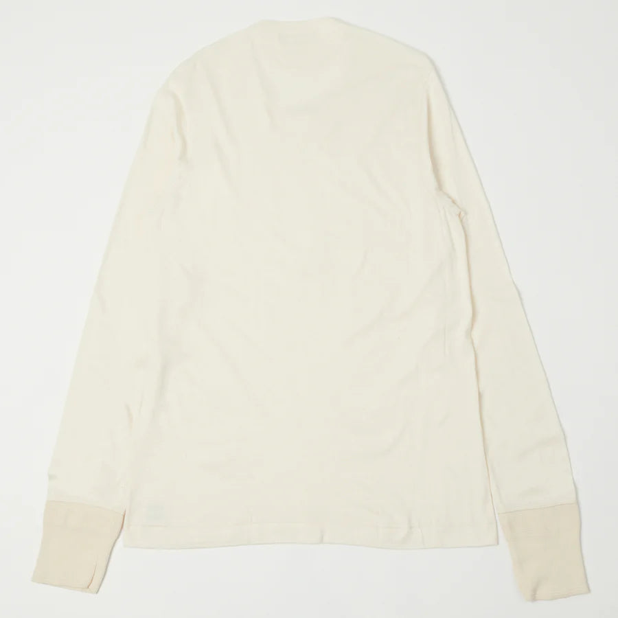 Beige long-sleeve shirt on a white background
