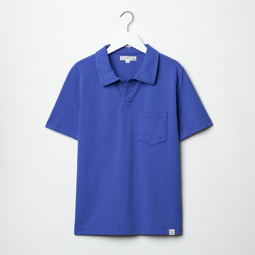 Blue single button polo shirt with patch chest pocket