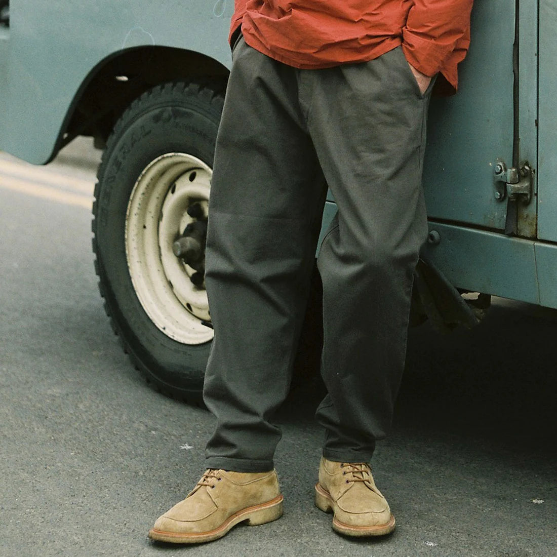 Styled with brown suede shoes and red top.