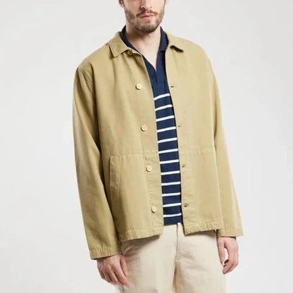 Pale Olive button down fisherman's jacket  with two front pockets and wooden buttons.