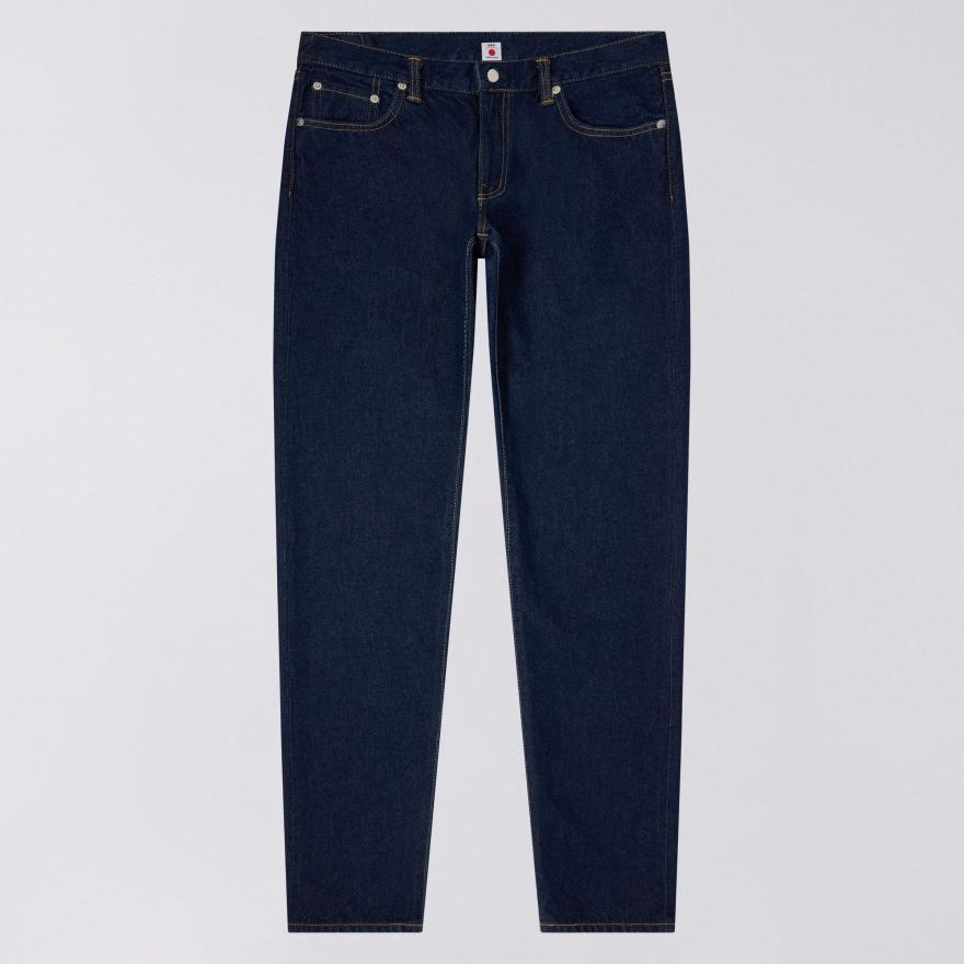 Navy blue jeans on a light gray background