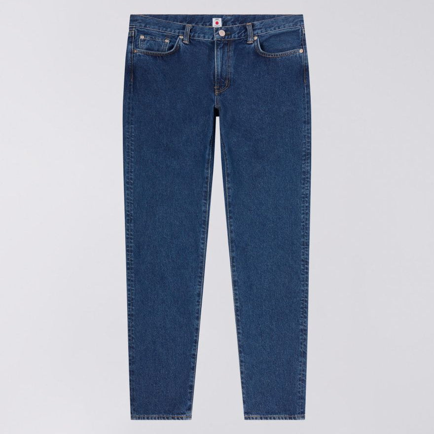 Blue jeans on a light gray background