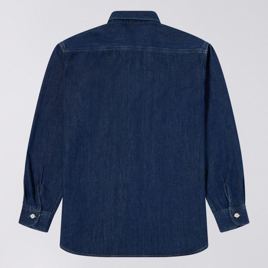 Blue denim shirt on a light gray background