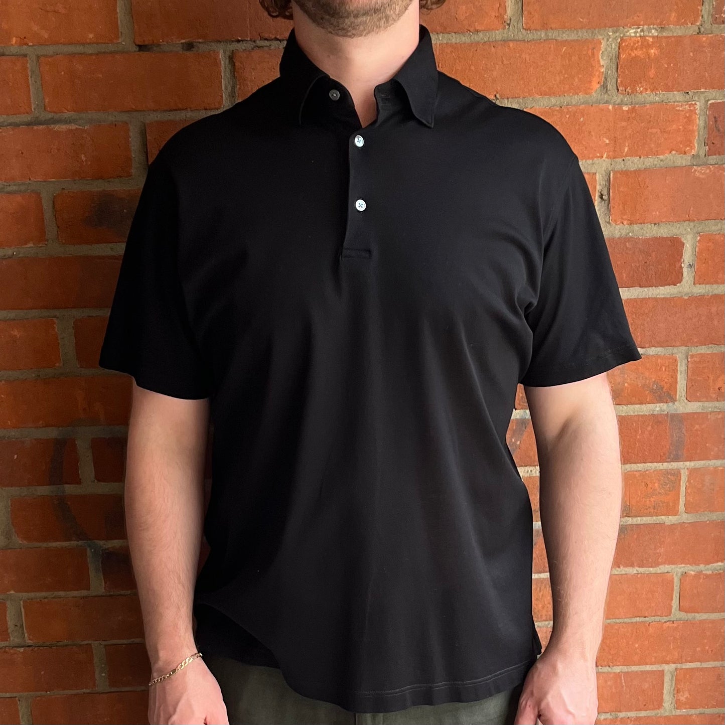 Black 100% Piquet Cotton polo shirt, lightweight breathable . 3 mother of pearls buttons.