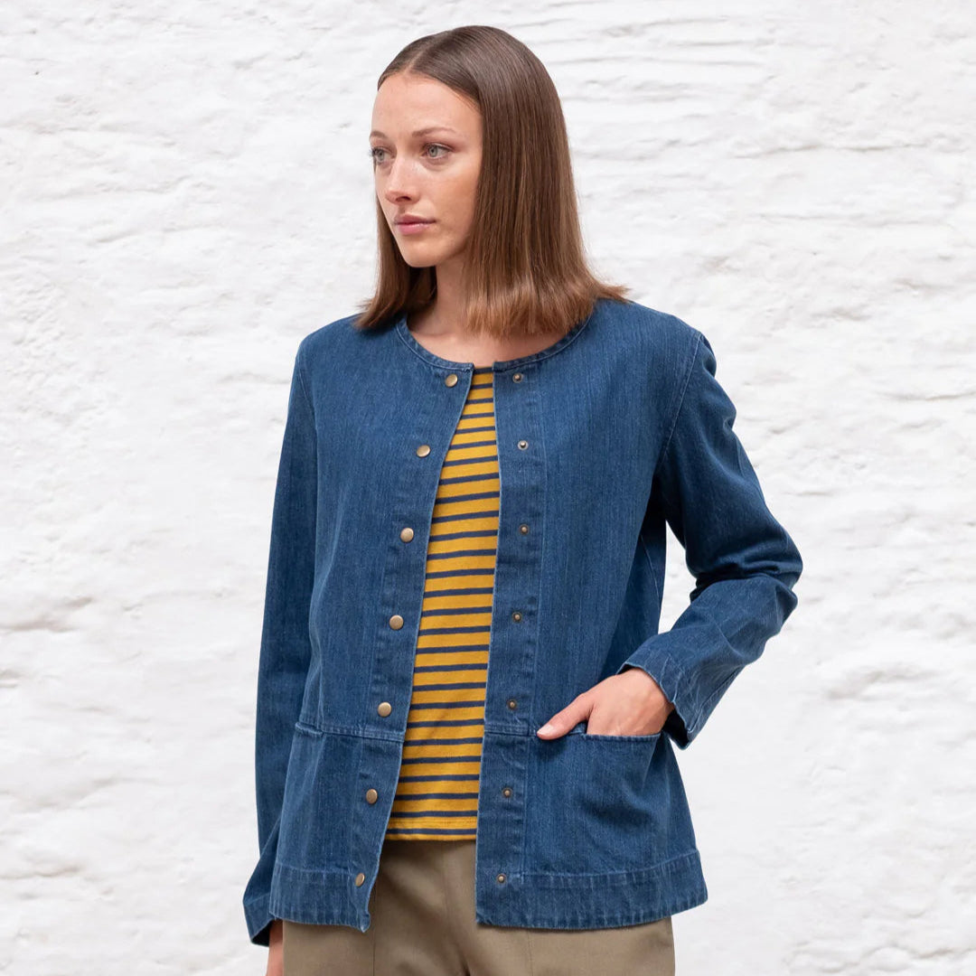Denim jacket with crew collar and popper closure. patch pockets on hem.