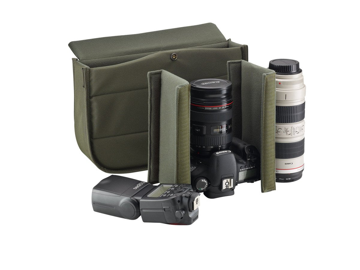 Travel, luggage and camera bag with removable padded insert for camera storage from Great British travelware experts Billingham, featuring waterproof composition, real grain leather, brass fittings and 5-year guarantee.