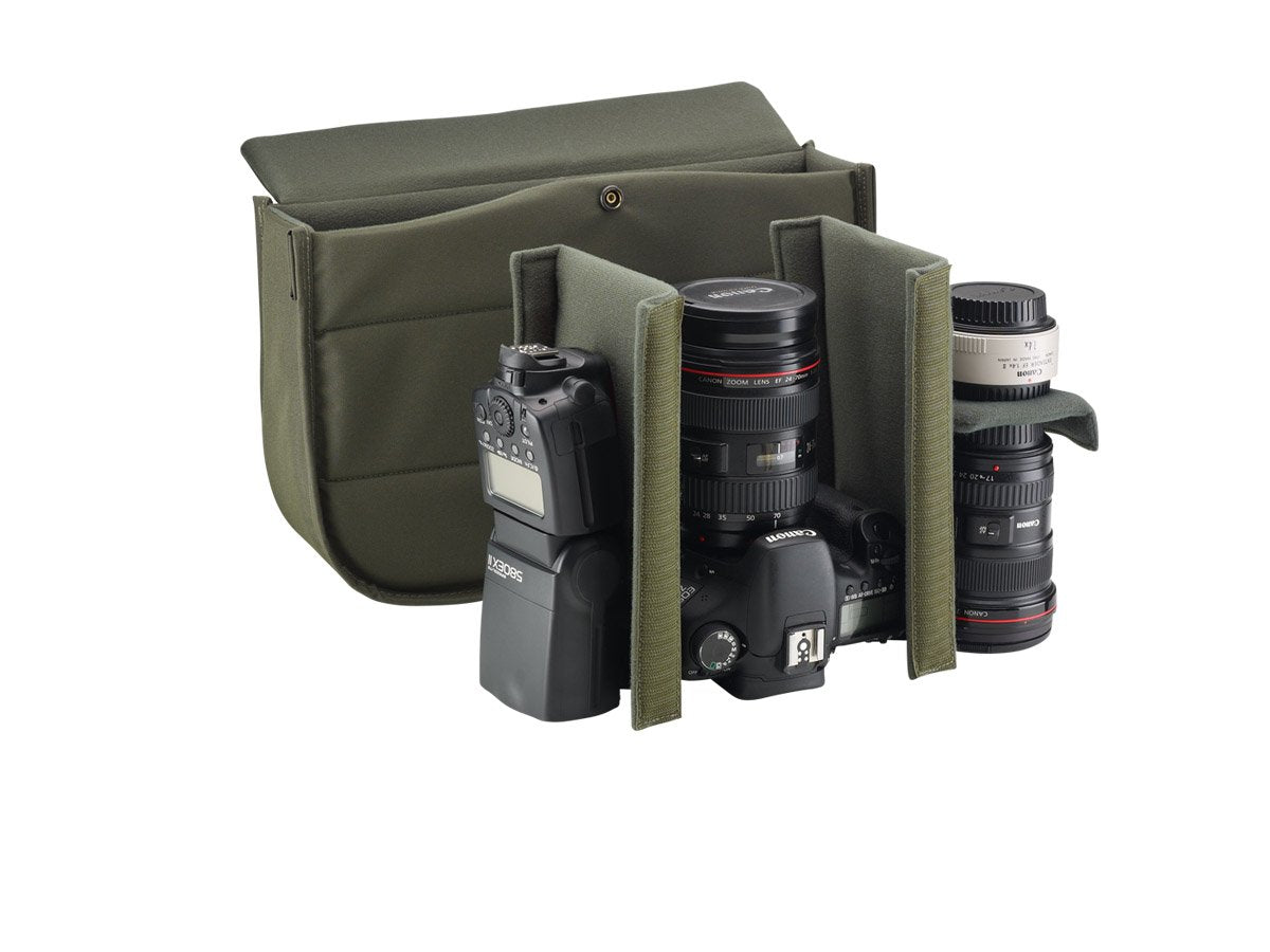 Travel, luggage and camera bag with removable padded insert for camera storage from Great British travelware experts Billingham, featuring waterproof composition, real grain leather, brass fittings and 5-year guarantee.