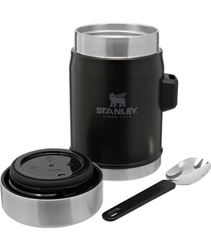 Leak-proof seven-hour heat retention vacuum food jar for camping or trips away by pro-equipment suppliers Stanley, featuring integrated steel spork and lifetime warranty.