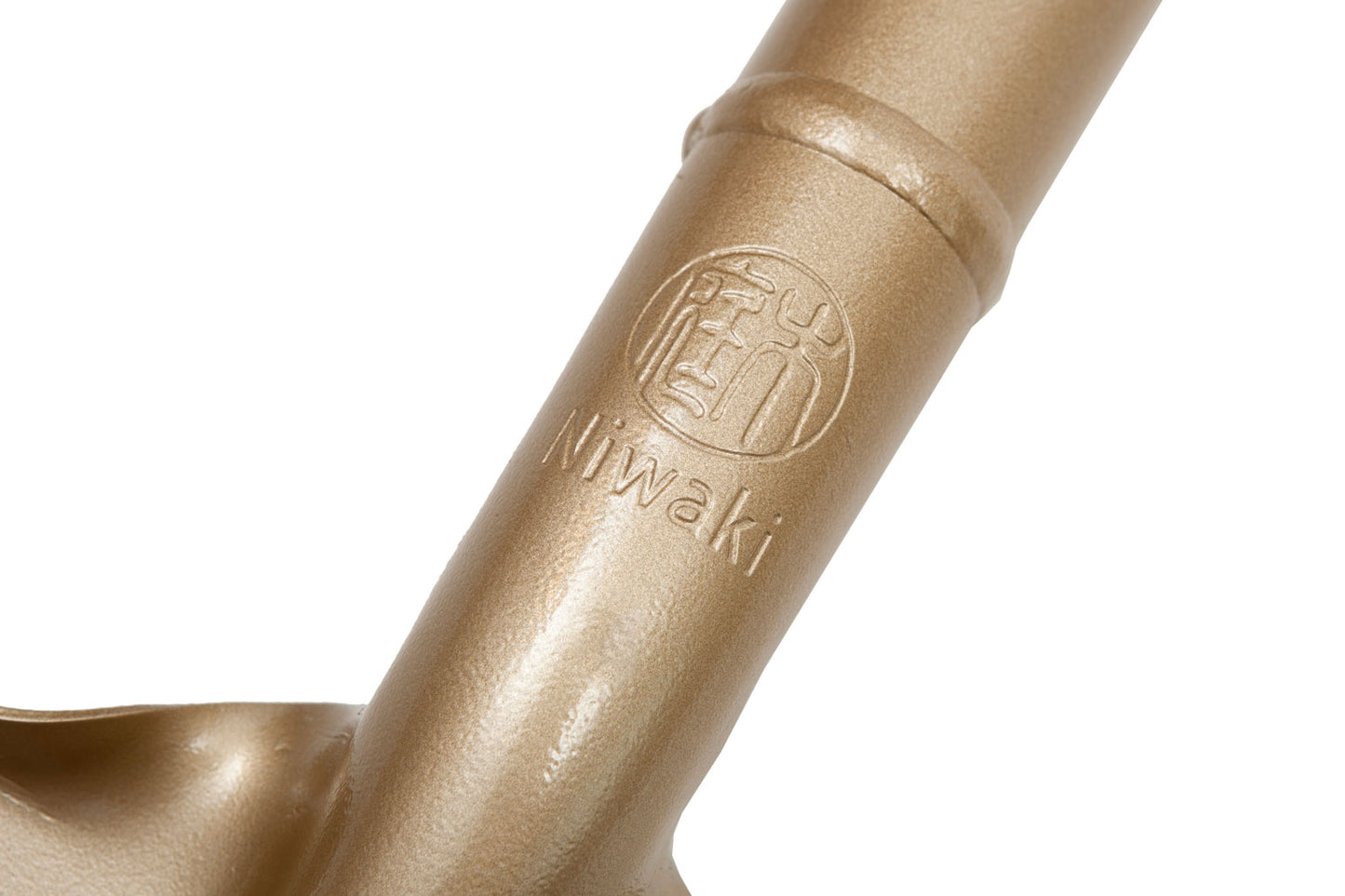 Gold-coloured sharp steel spade by Niwaki featuring pointed blade and solid tread for digging.