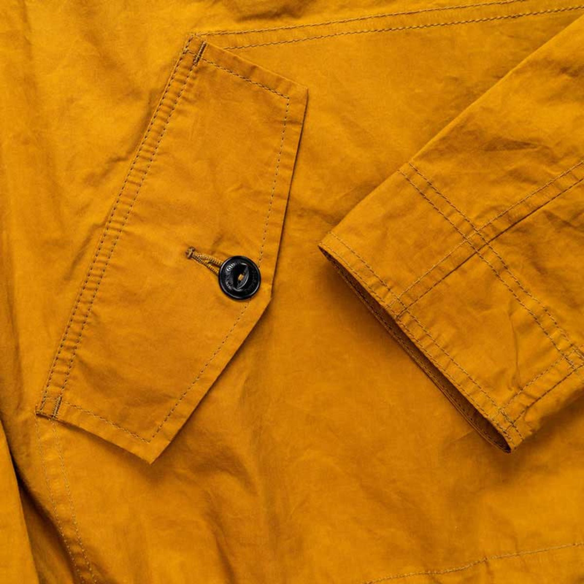 Mustard hooded smock by Yarmouth Oilskins. Wax finish and water repellent