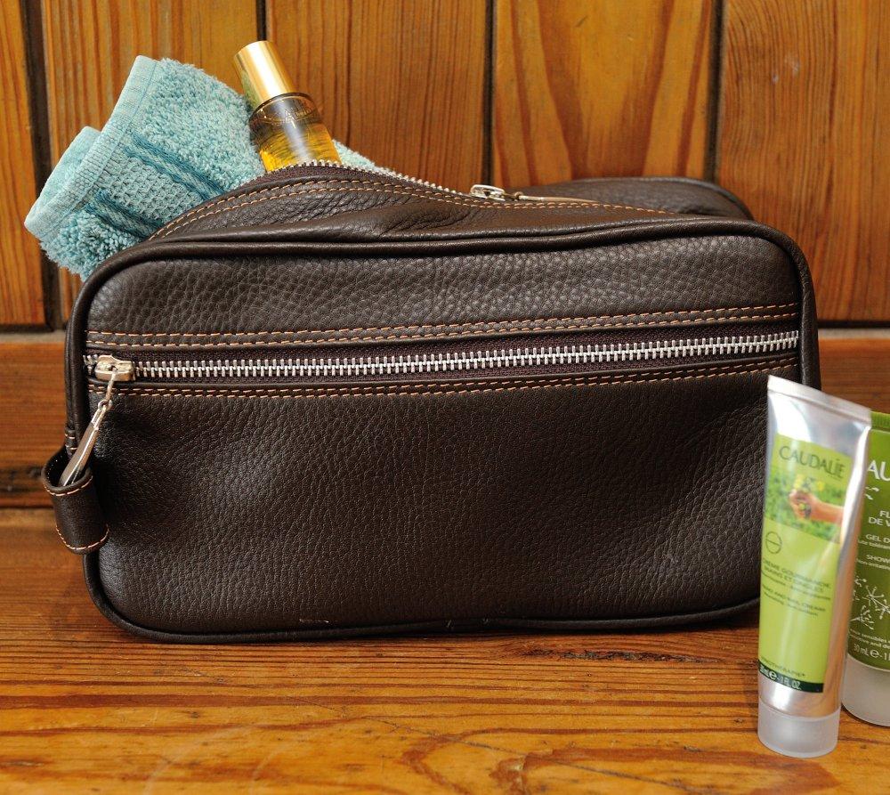 Soft leather washbag with waterproof lining, zip closure, carry handle and long internal and external pockets