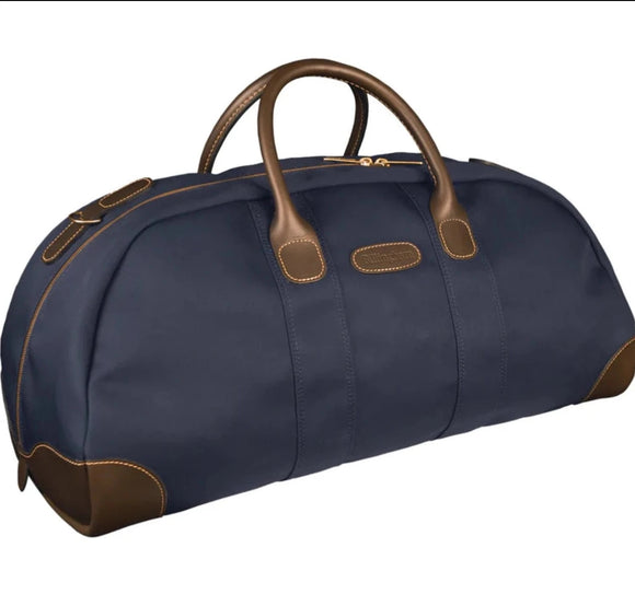 Travel bag weekender size in Navy with a lush Chocolate Leather from Great British travelware experts Billingham