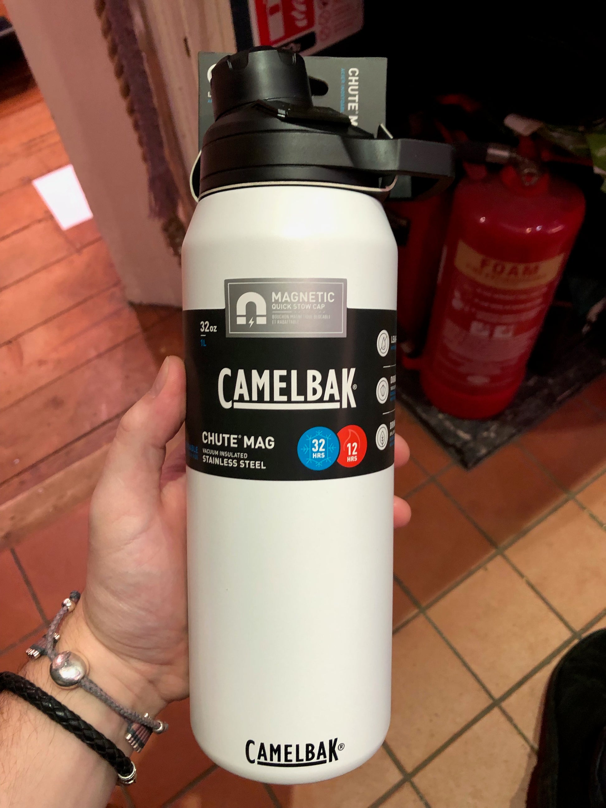 Stainless steel vacuum insulated thermos/bottle by technological wizards Camelbak, featuring leak-proof design, magnetic cap and easy carry handle.