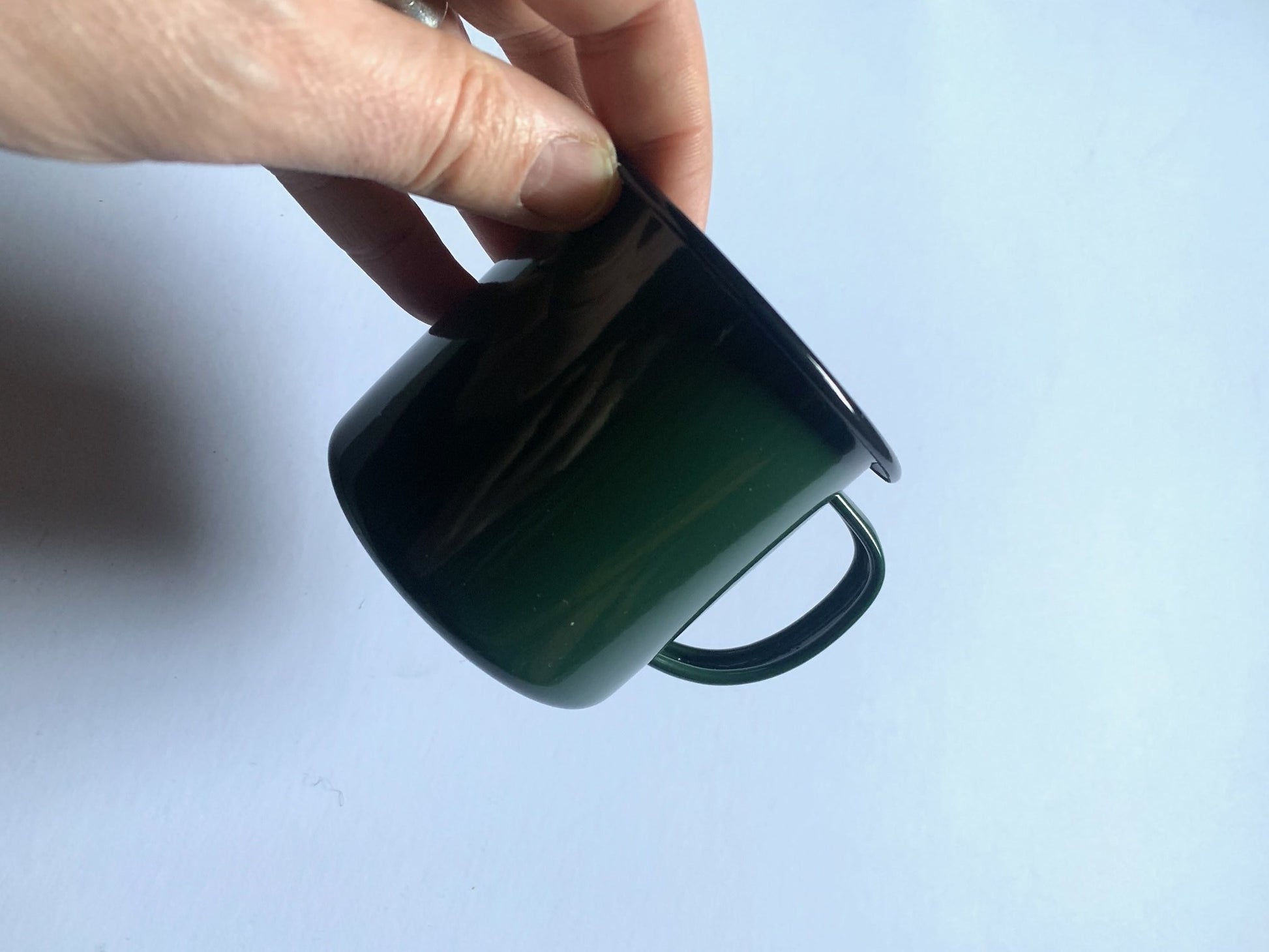 Green enamelware espresso cup from original enamelware brand Falcon which is oven, dishwasher, freezer, electric and gas hob friendly.