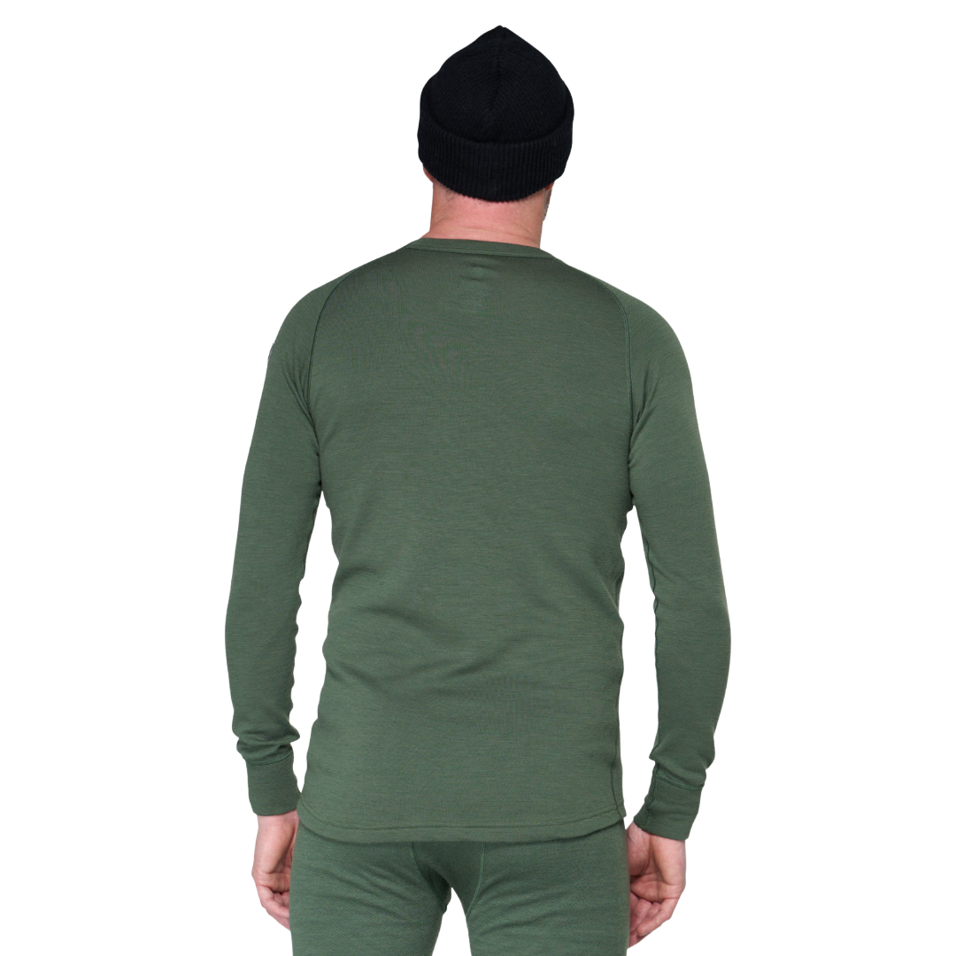 A man shown from the back wearing a dark olive green long-sleeve shirt and matching green pants, with a black beanie, against a plain white background.