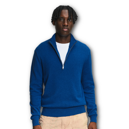 Man wearing Aigle  blue quarter-zip sweater on a white background sold at Regent in Salisbury