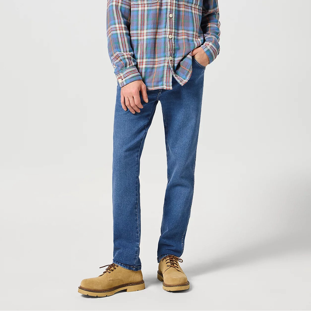 Wrangler Texas Slim Medium stretch jeans in Ridge wash light blue, 
available a Regent Tailoring Salisbury UK