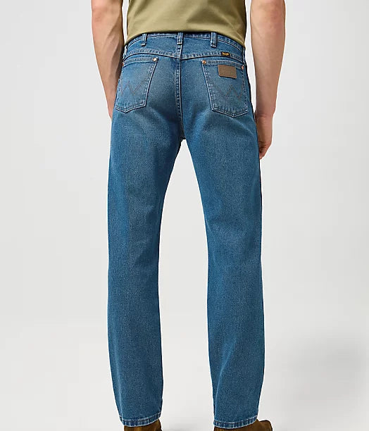 back of cowboy cut jeans