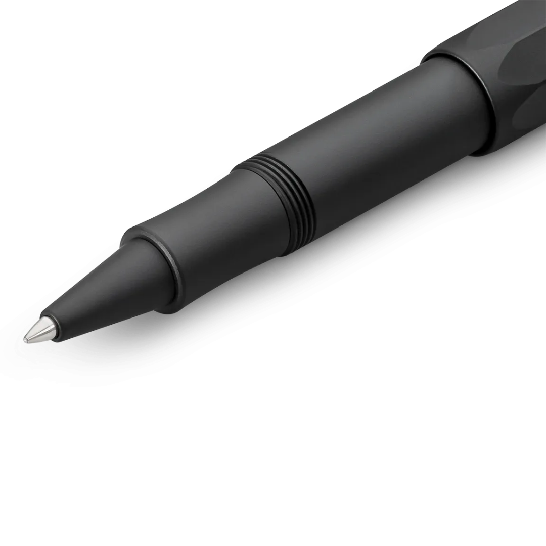 A close-up of a matte black ballpoint pen with a silver metal tip, shown diagonally on a clean white background.
