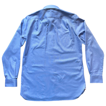 A light blue long-sleeve button-up shirt shown from the back, laid flat 