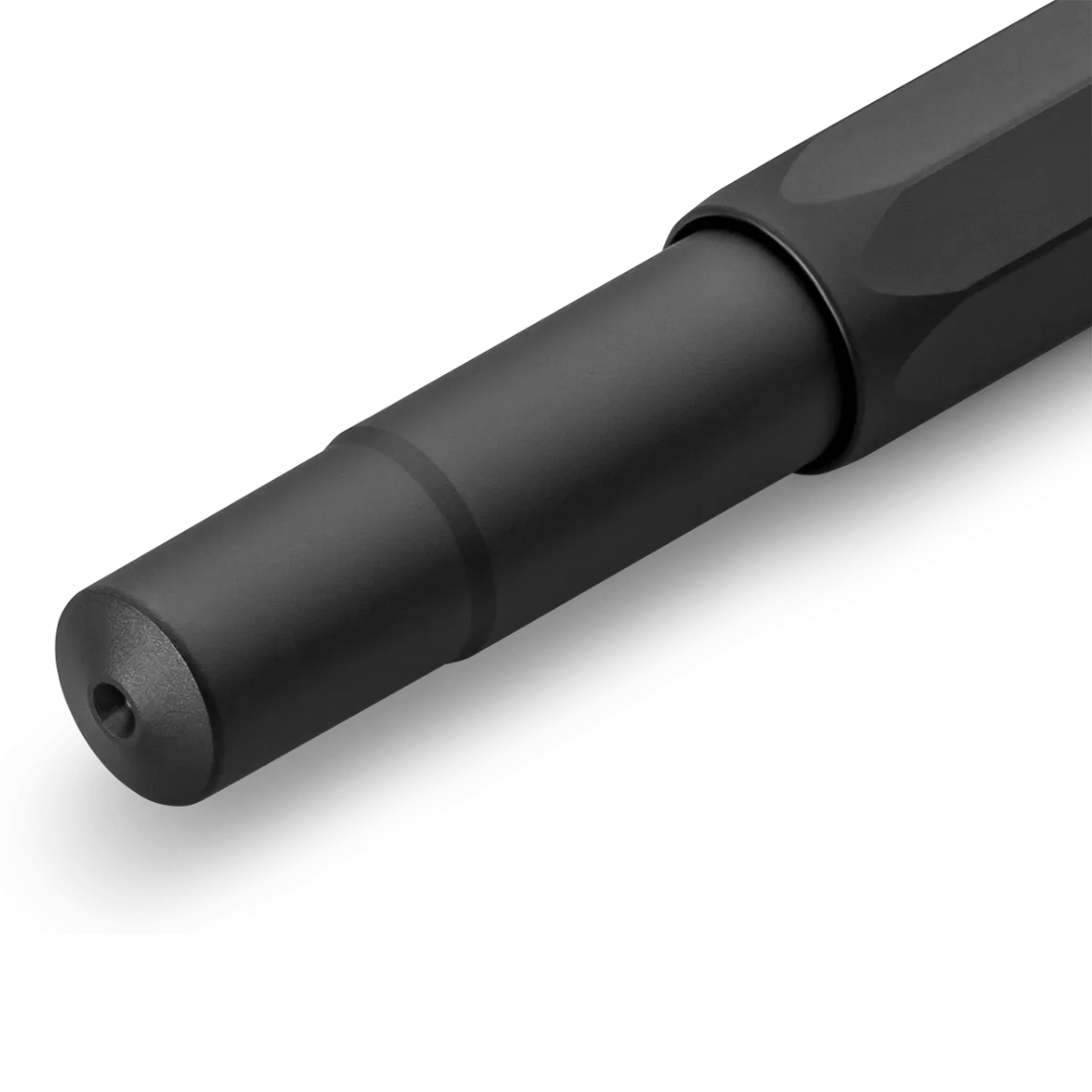 A close-up of a matte black pen on a clean white background.