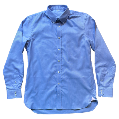 A light blue long-sleeve button-down shirt with a classic collar and button-up front, laid flat