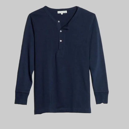 Navy long-sleeve henley shirt on a light gray background