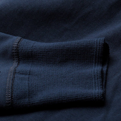 Close-up of a navy blue fabric texture