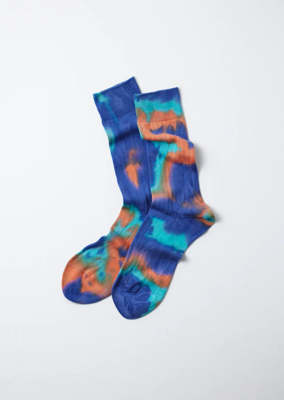 Blue, orange and turquoise tie dye socks ribbing and cuff at top. 