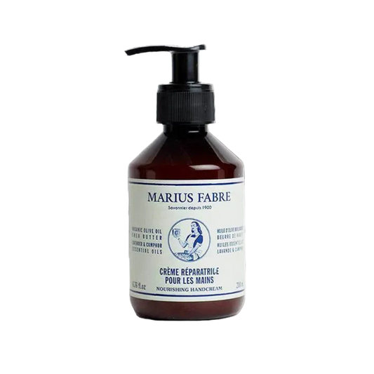 A bottle of Marius Fabre Crème Réparatrice pour les mains, featuring a dark amber brown bottle with a black pump dispenser and a white label with blue text.