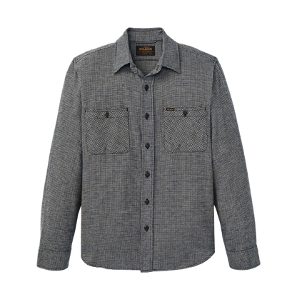 A long-sleeve button-up shirt by Patagonia in a dark gray and black micro-check pattern, featuring two chest pockets and a collar.
