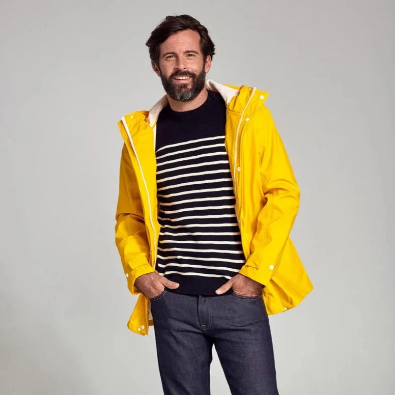 Classic yellow raincoat with contrast white zip and poppers. 