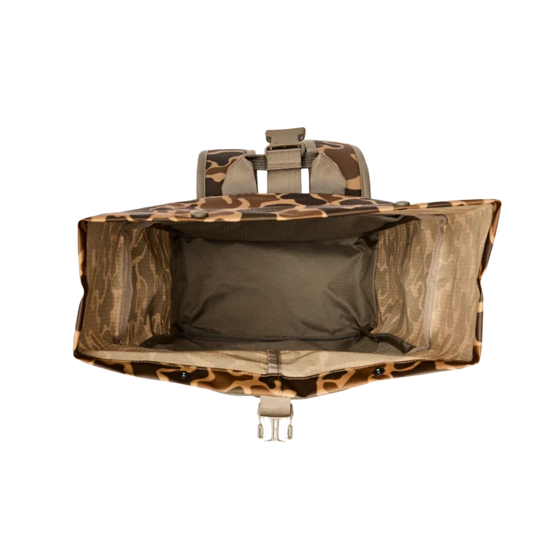 An overhead view of a tactical backpack shown open, displaying its interior storage compartments, mesh pockets, and adjustable straps. The backpack features a brown and tan camouflage pattern with a solid dark olive-brown interior lining.