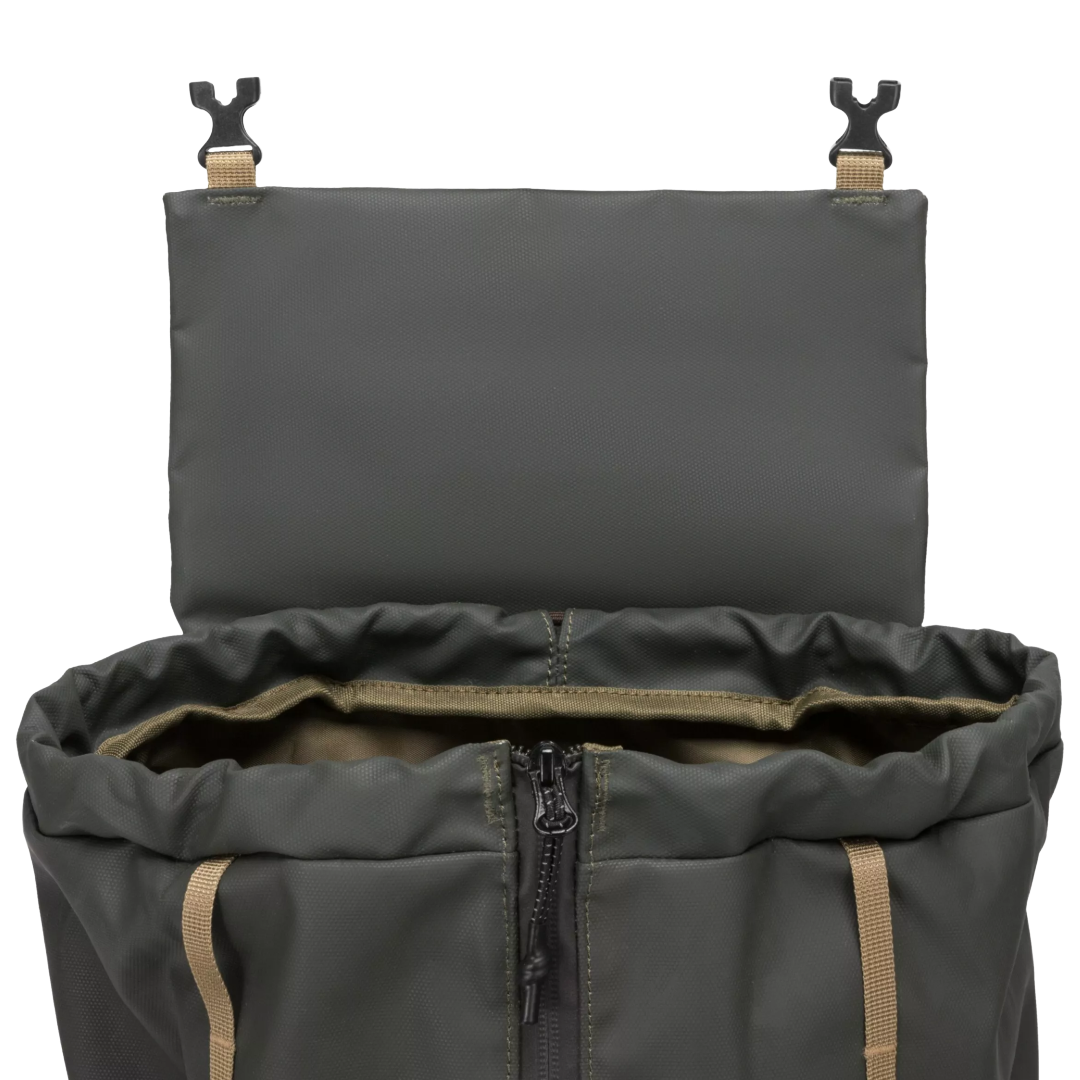 An open olive green drawstring backpack shown from above, revealing a gray interior lining, multiple zippered compartments, and a brown-and-orange patterned drawstring cord.
